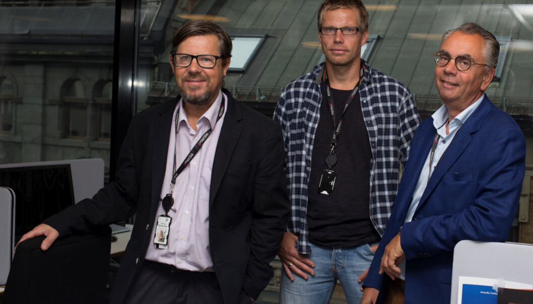 Redaktør Kjell Werner (til høyre) mener LO Medias oppkjøp blir en god løsning for Avisenes Nyhetsbyrå. Her sammen med ANB-journalistene Helge Rønning Birkelund og Aslak Bodahl (i midten). Foto: Øyvind Aukrust, LO Media Redaktør Kjell Werner (til høyre) mener LO Medias oppkjøp blir en god løsning for Avisenes Nyhetsbyrå. Her sammen med ANB-journalistene Helge Rønning Birkelund og Aslak Bodahl (i midten). Foto: Øyvind Aukrust, LO Media