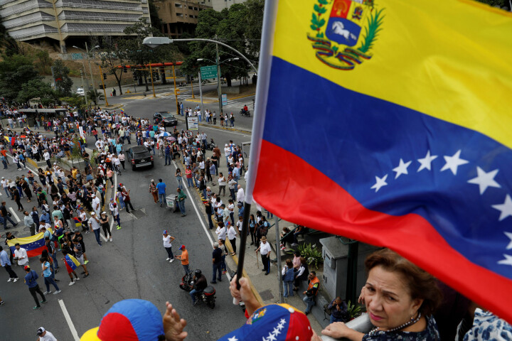 Flere utenlandske journalister ble pågrepet i Venezuela, fordi de manglet pressekort. Foto: Stringer / Reuters / NTB Scanpix