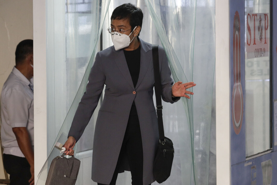 Rappler-redaktør Maria Ressa, med beskyttelsesmaske før domsavsigelsen mandag. Rappler-redaktør Maria Ressa, med beskyttelsesmaske før domsavsigelsen mandag.