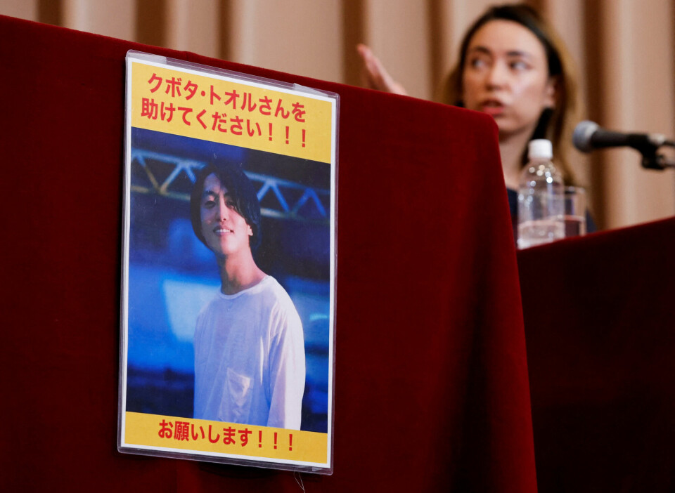 Et bilde av fengslede Toru Kubota fra et protestmøte i Tokyo.